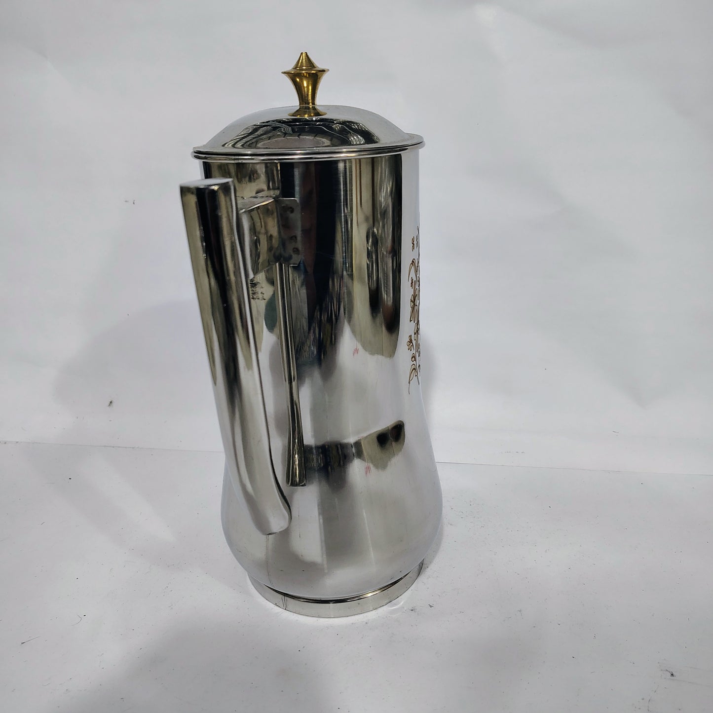 Asha-Stainless Steel Jug /Made with 100% Pure Steel with beautiful design. Get it at Wholesale price..